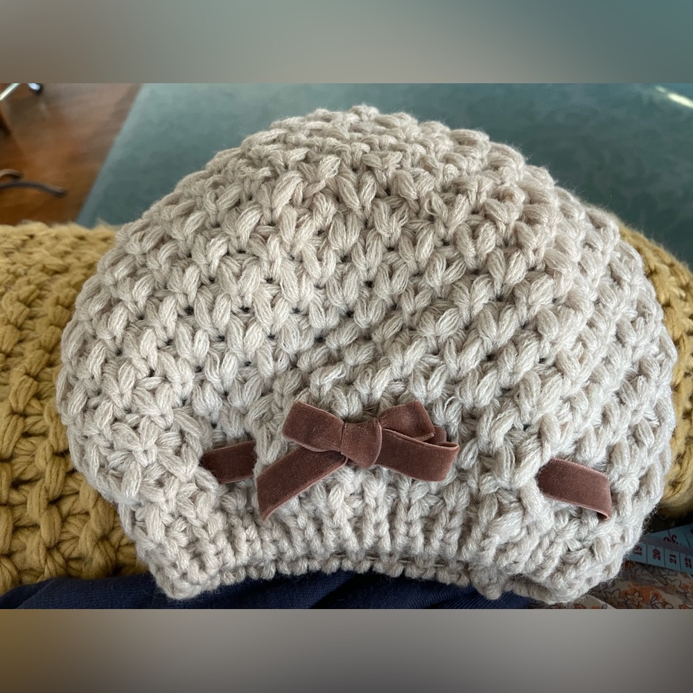 Dolls Kill knitted beanie, velvet ribbon weaved through with a sweet little bow.